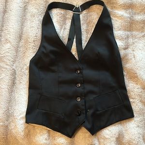 21 super cute fitted sleek black vest looks new! Size S
